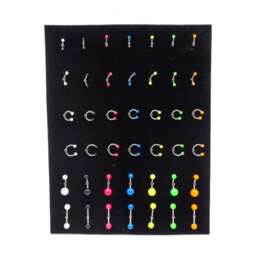 Piercing assortiti con palline fluo